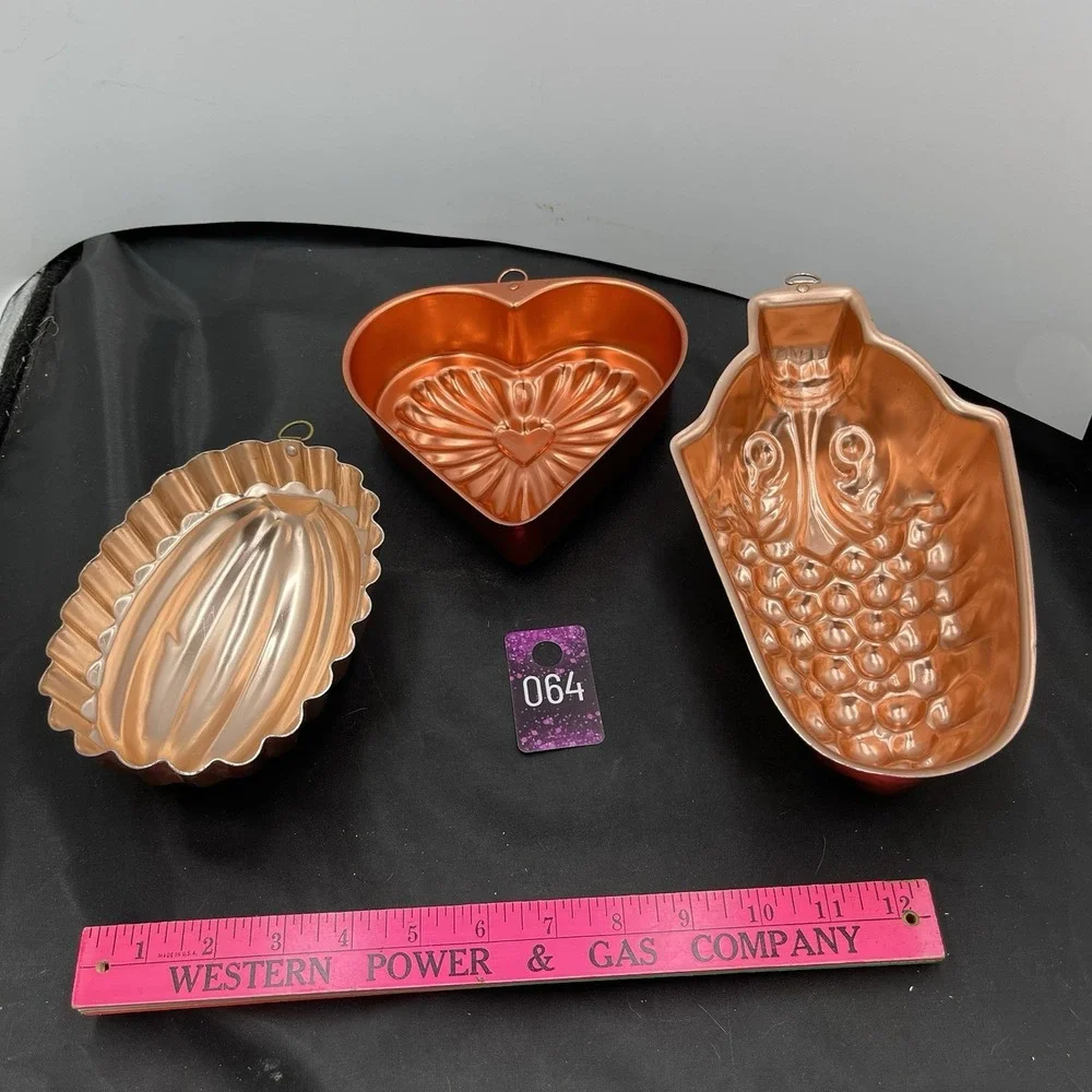 Three metal  Jell-O‎ wall hanging mold